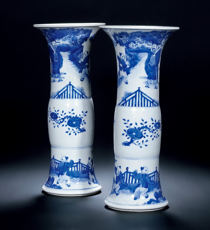 Qing Dynasty A PAIR OF BLUE AND WHITE FLOWER VASES WITH DESIGN OF SCHOLAR